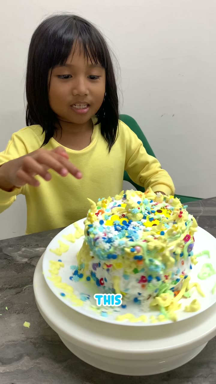 Zara with her decorated cake